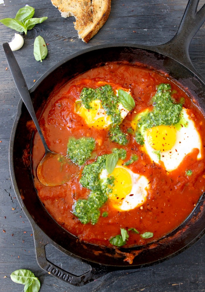 Skillet of Uova in Purgatorio or Eggs in Purgatory in Arrabiata Sauce with Pesto and Bruschetta Skillet of Uova in Purgatorio or Eggs in Purgatory in Arrabiata Sauce with Pesto and Bruschetta
