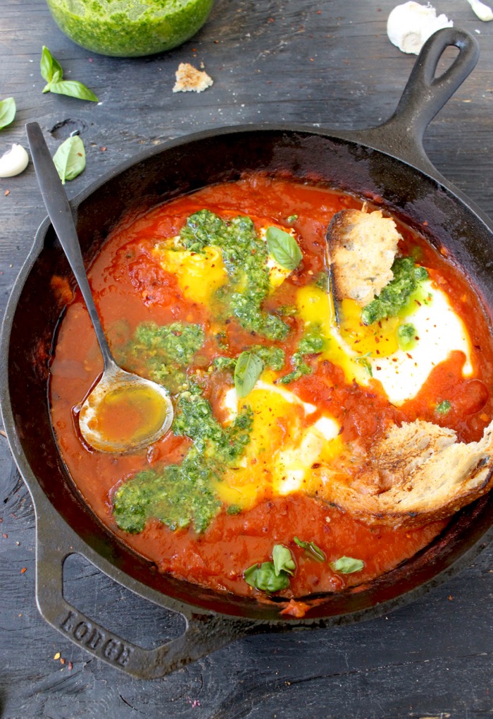 Skillet of Uova in Purgatorio or Eggs in Purgatory in Arrabiata Sauce with Pesto and Bruschetta Skillet of Uova in Purgatorio or Eggs in Purgatory in Arrabiata Sauce with Pesto and Bruschetta
