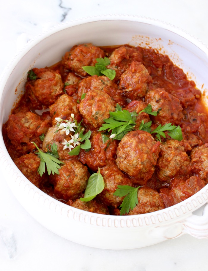 Ricotta Meatballs in Red Sauce in a White Ceramic Bowl Ricotta Meatballs in Red Sauce in a White Ceramic Bowl