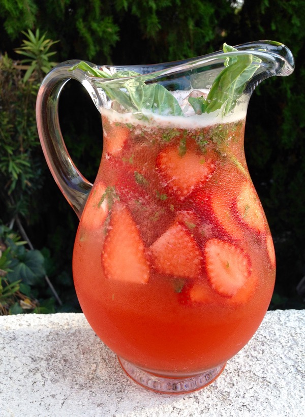 Pitcher of Strawberry Basil Lemonade in the Garden Pitcher of Strawberry Basil Lemonade in the Garden