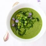healthy leek soup with chive oil and green peas