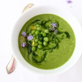 healthy leek soup with chive oil and green peas