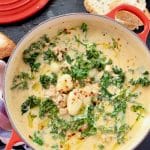 Red Bowl of Gnocchi Zuppa Italian Soup with Kale and Sausage