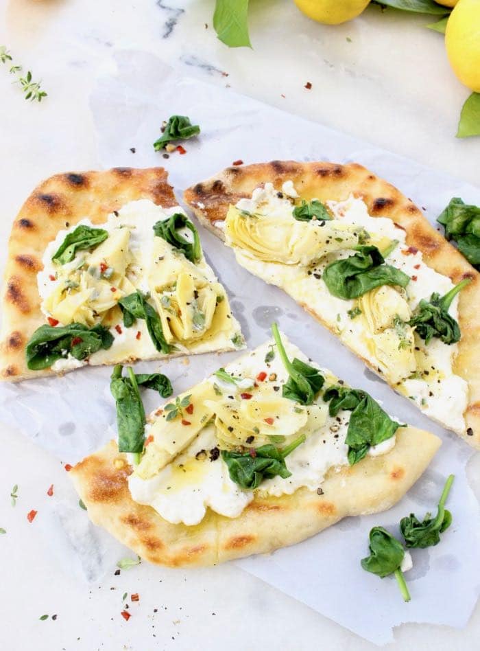 Sliced Thin Crust Spinach Artichoke Pizza Bianca Sliced Thin Crust Spinach Artichoke Pizza Bianca